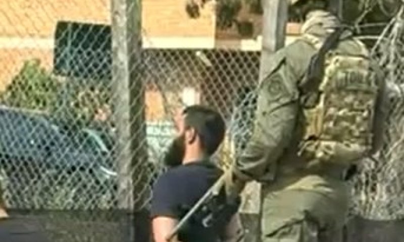 A screenshot from the video of the arrest.