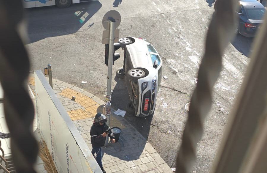 A police car flipped over.