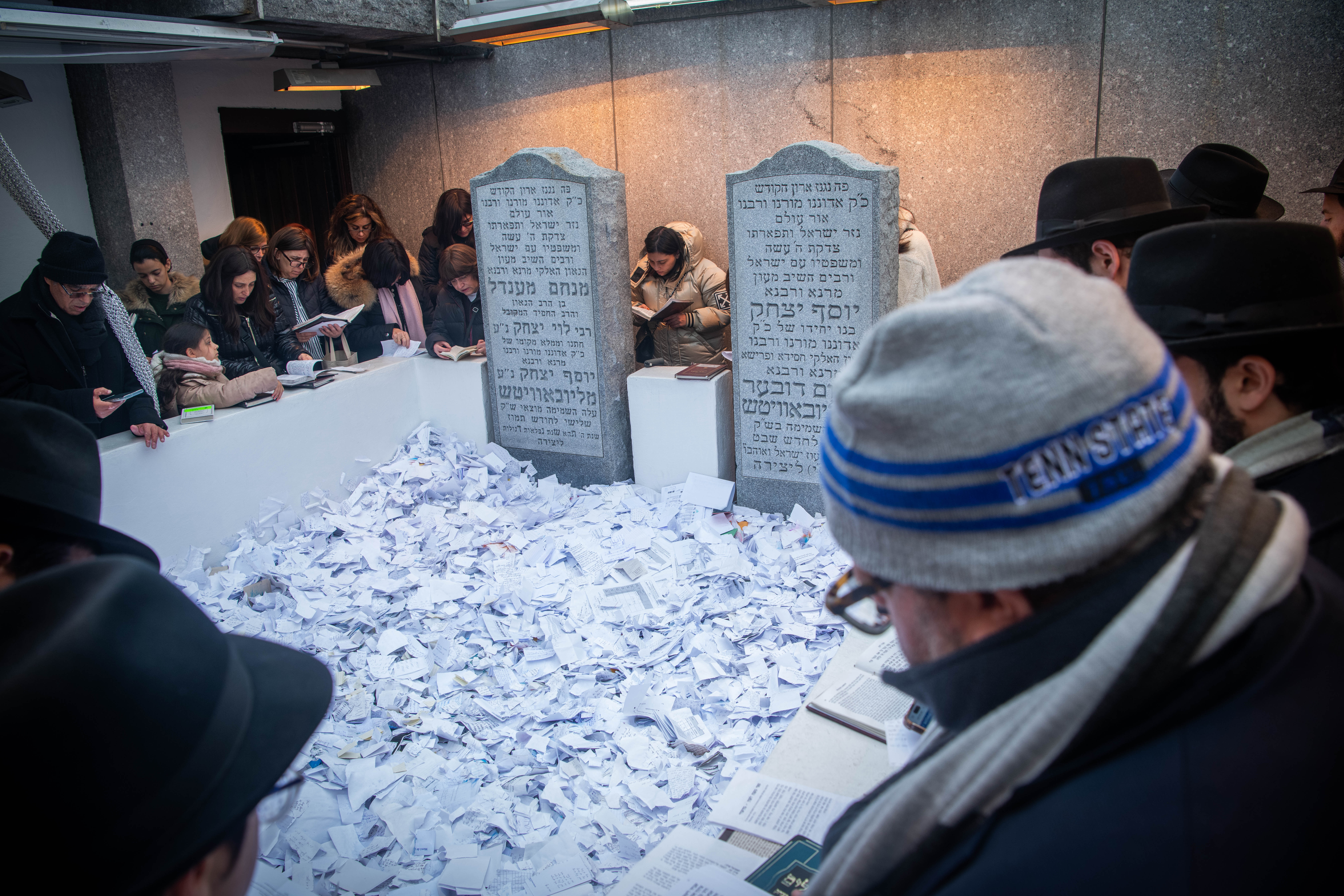 Jews pray at the gravesite of the late Lubavitcher Rebbe, Rabbi Menachem Mendel Schneerson, in Queens, New York, U.S., January 31, 2023. 