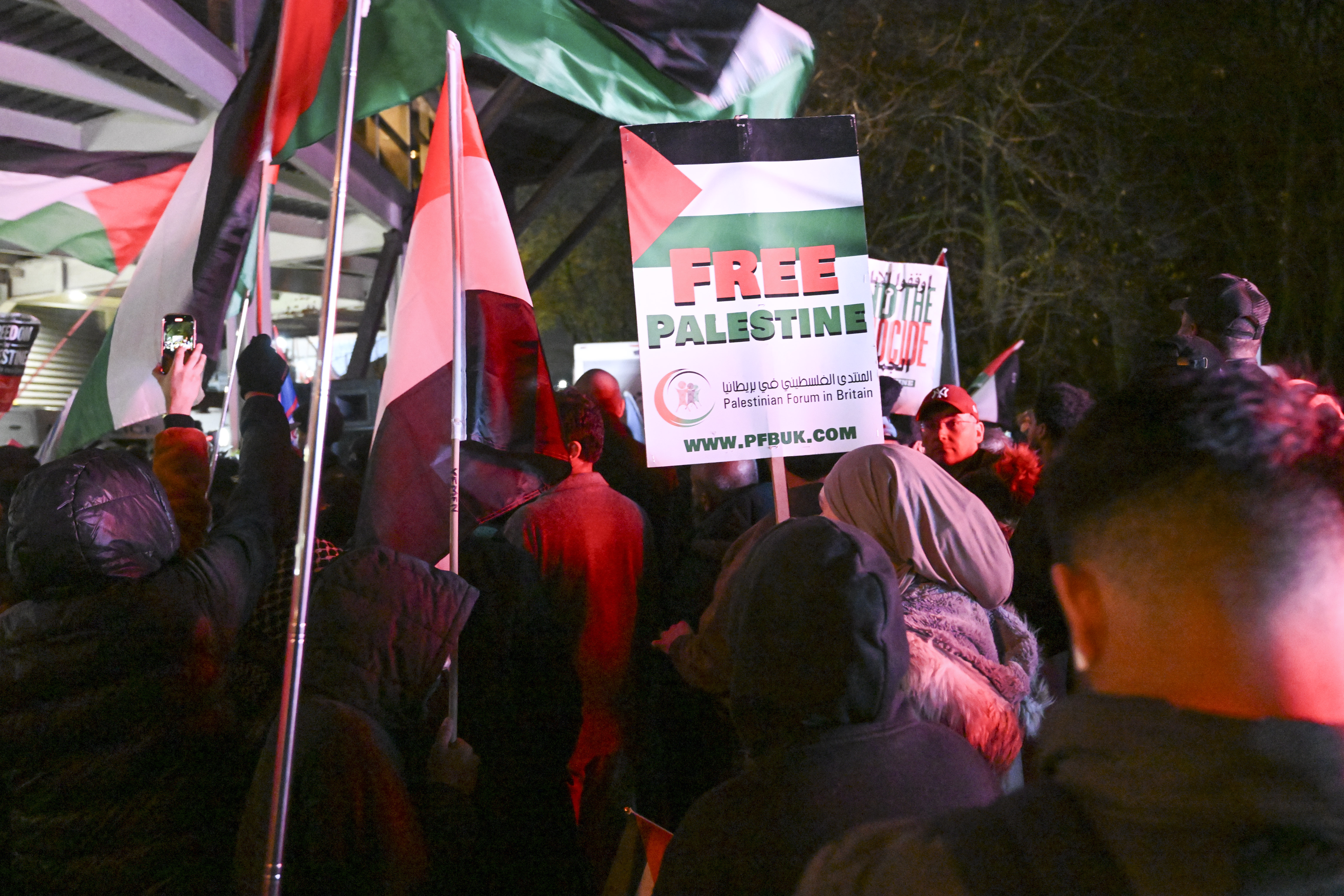 Pro-Palestinian demonstrators protest outside the UEFA Europa League match between Maccabi Tel Aviv and Aston Villa at Villa Park Stadium in Birmingham, England, November 6, 2025.