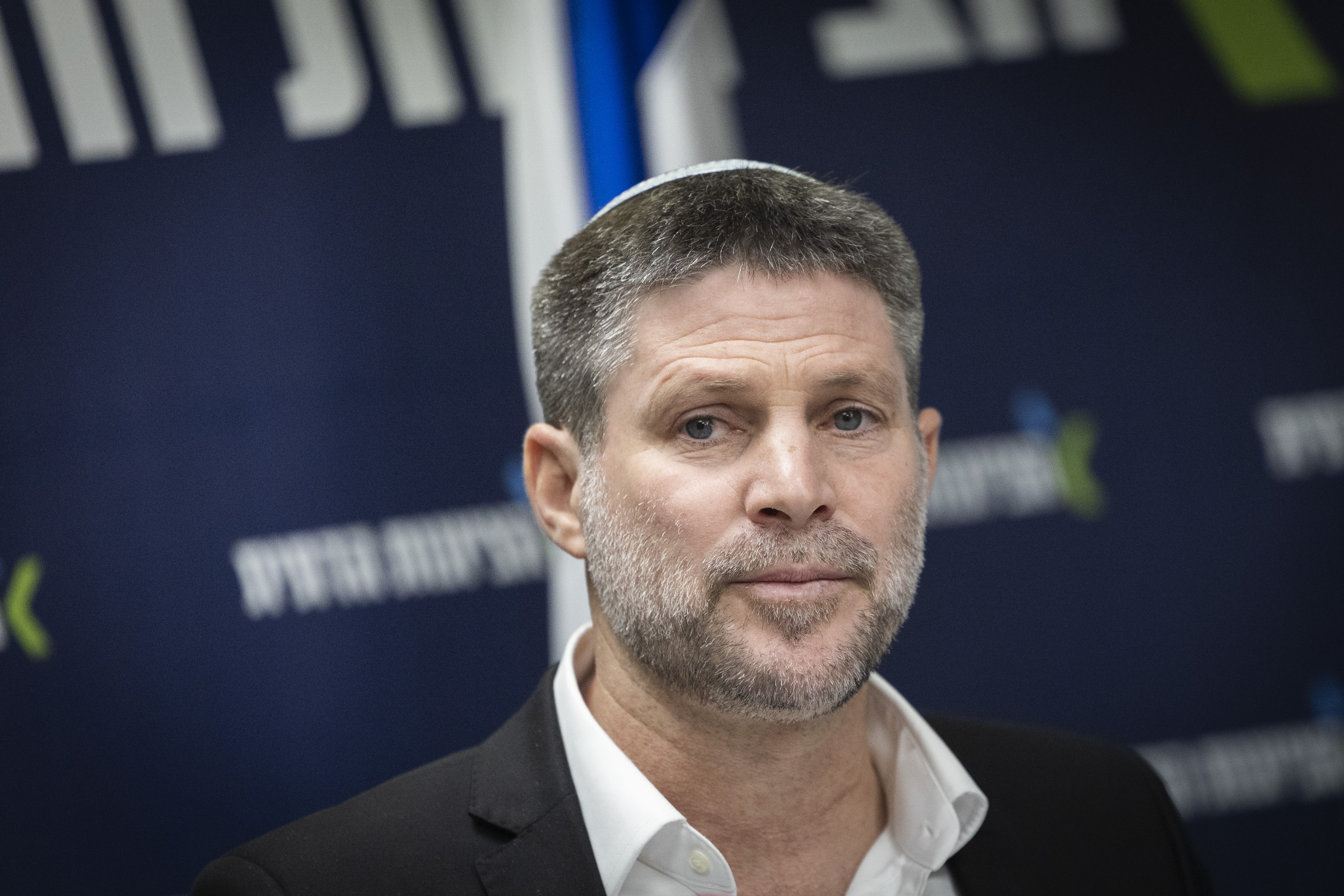 Minister of Finance and Head of the Religious Zionist Party Bezalel Smotrich leads a faction meeting at the Knesset, the Israeli parliament in Jerusalem, December 1, 2025.
