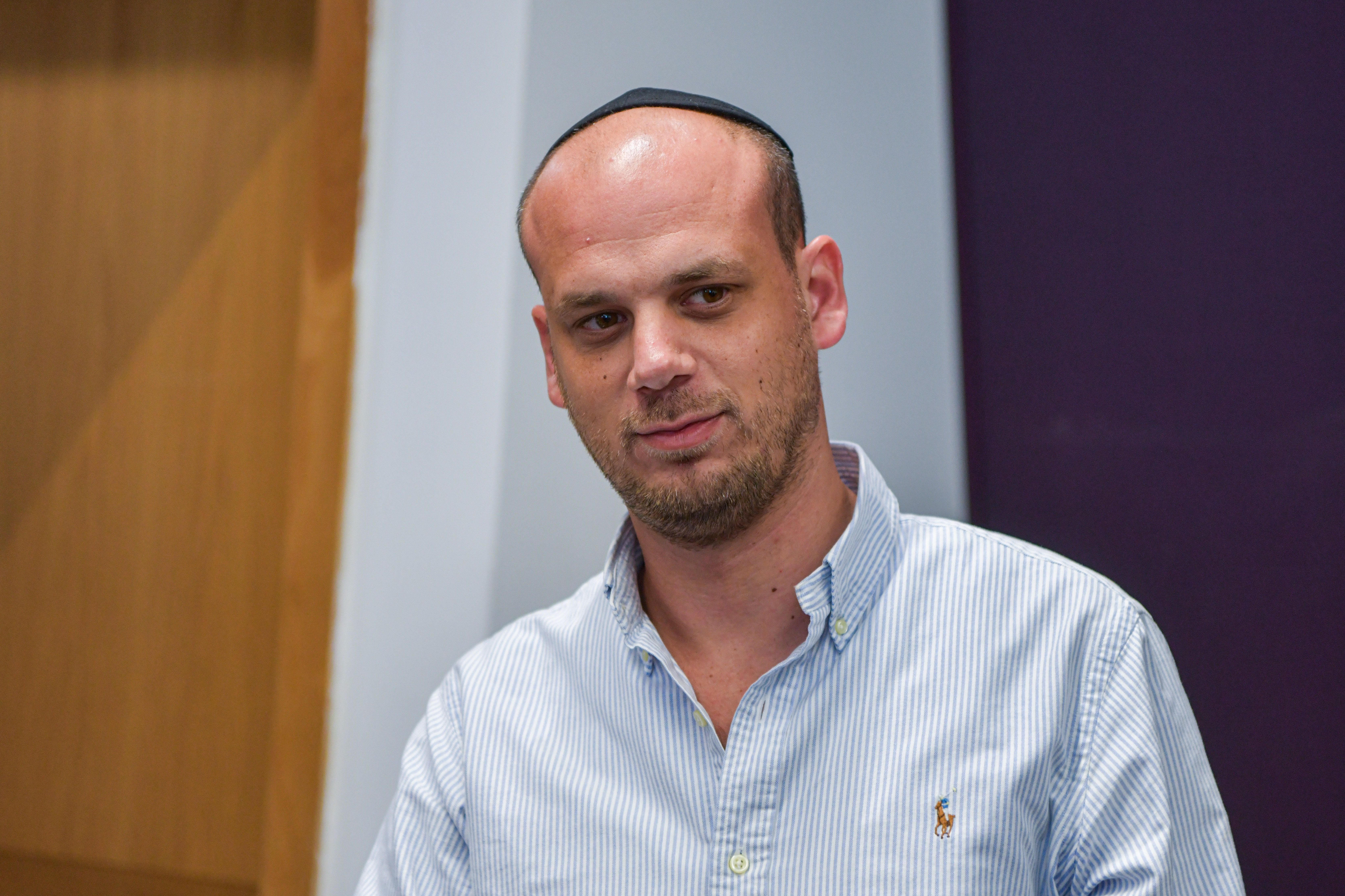 Eli Feldstein, one of the suspects in the so-called Qatargate investigation arrives for a court hearing at the Tel Aviv District Court on July 15, 2025.