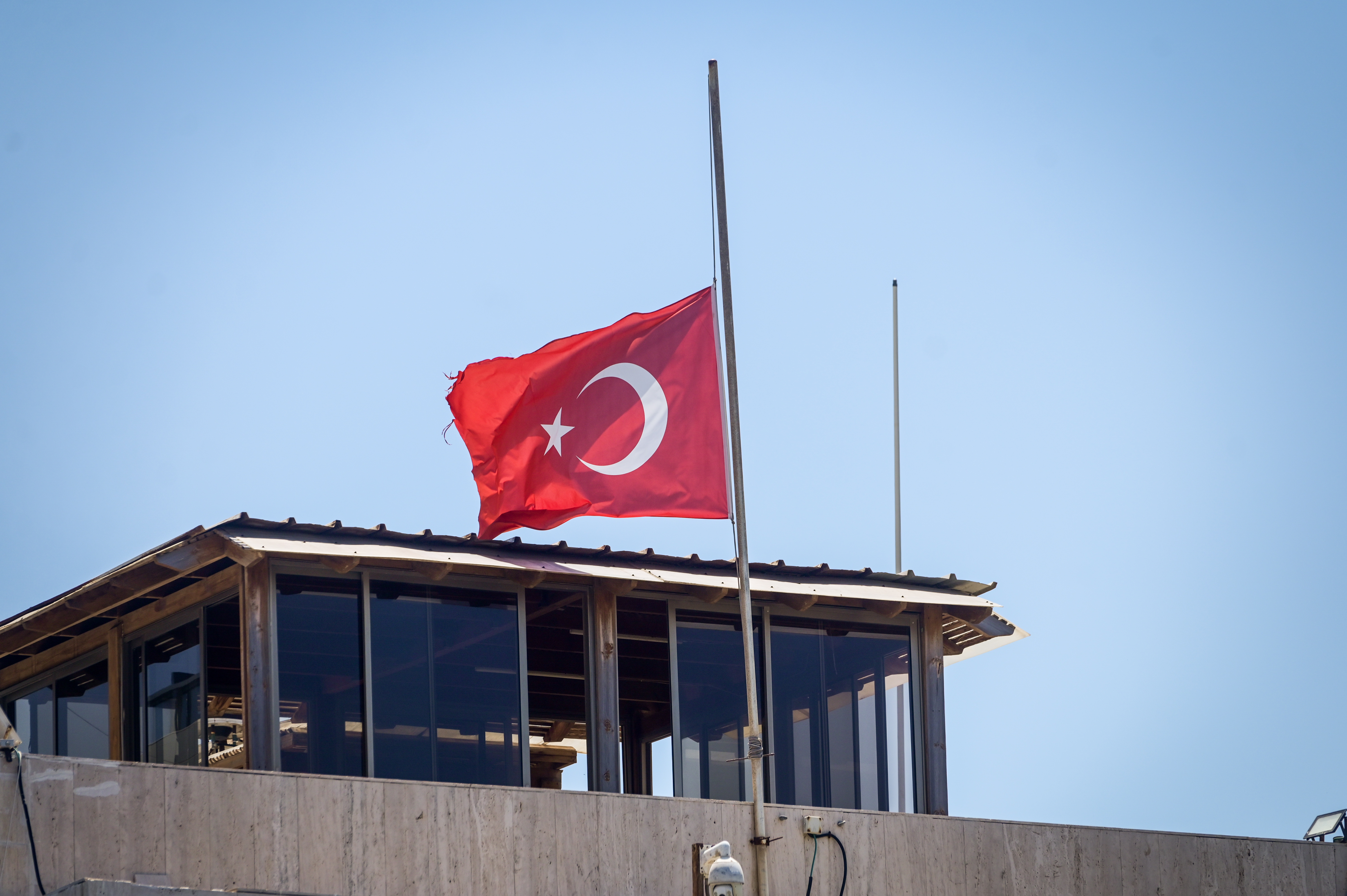 The turkish flag at half mast in honor of late Hamas leader Ismail Haniyeh at the Turkish Embassy in Tel Aviv on August 2, 2024.