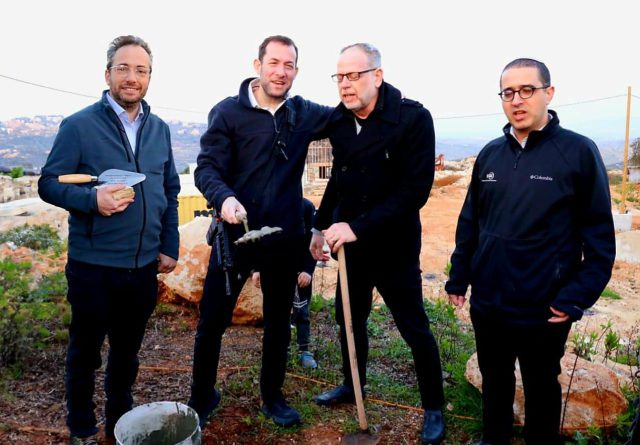 The cornerstone of the new neighborhood being laid last year.