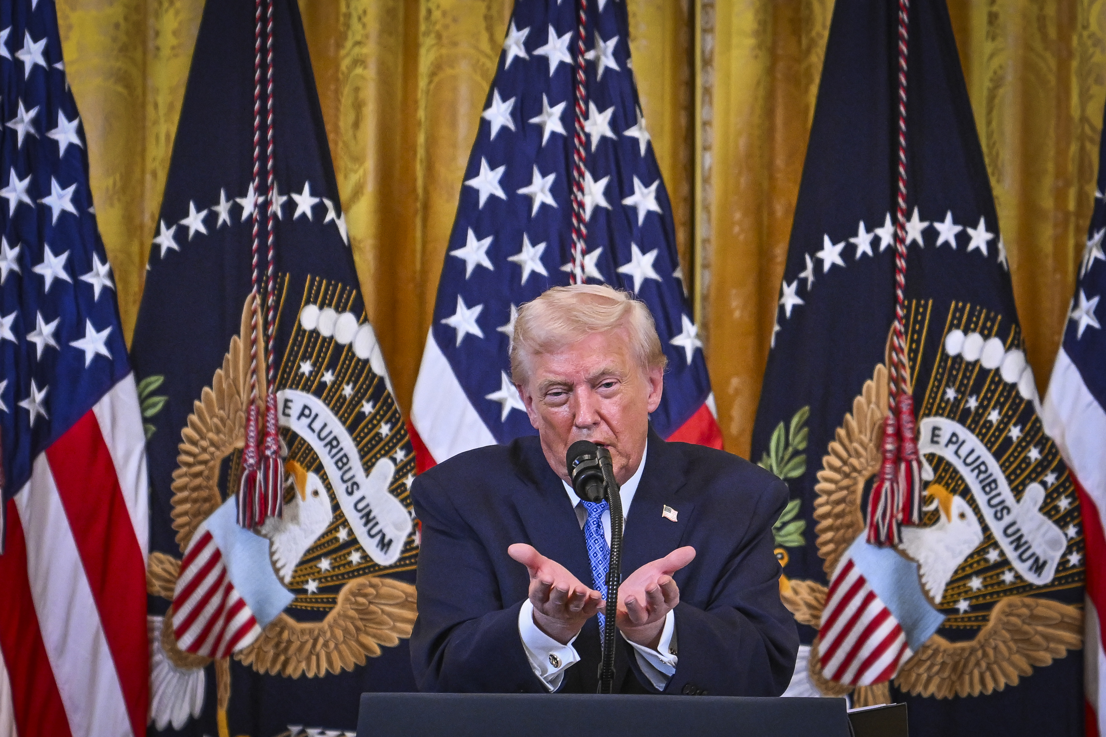 U.S. President Donald Trump attends a Hanukkah reception in the East Room of the White House in Washington, D.C., on December 16, 2025.