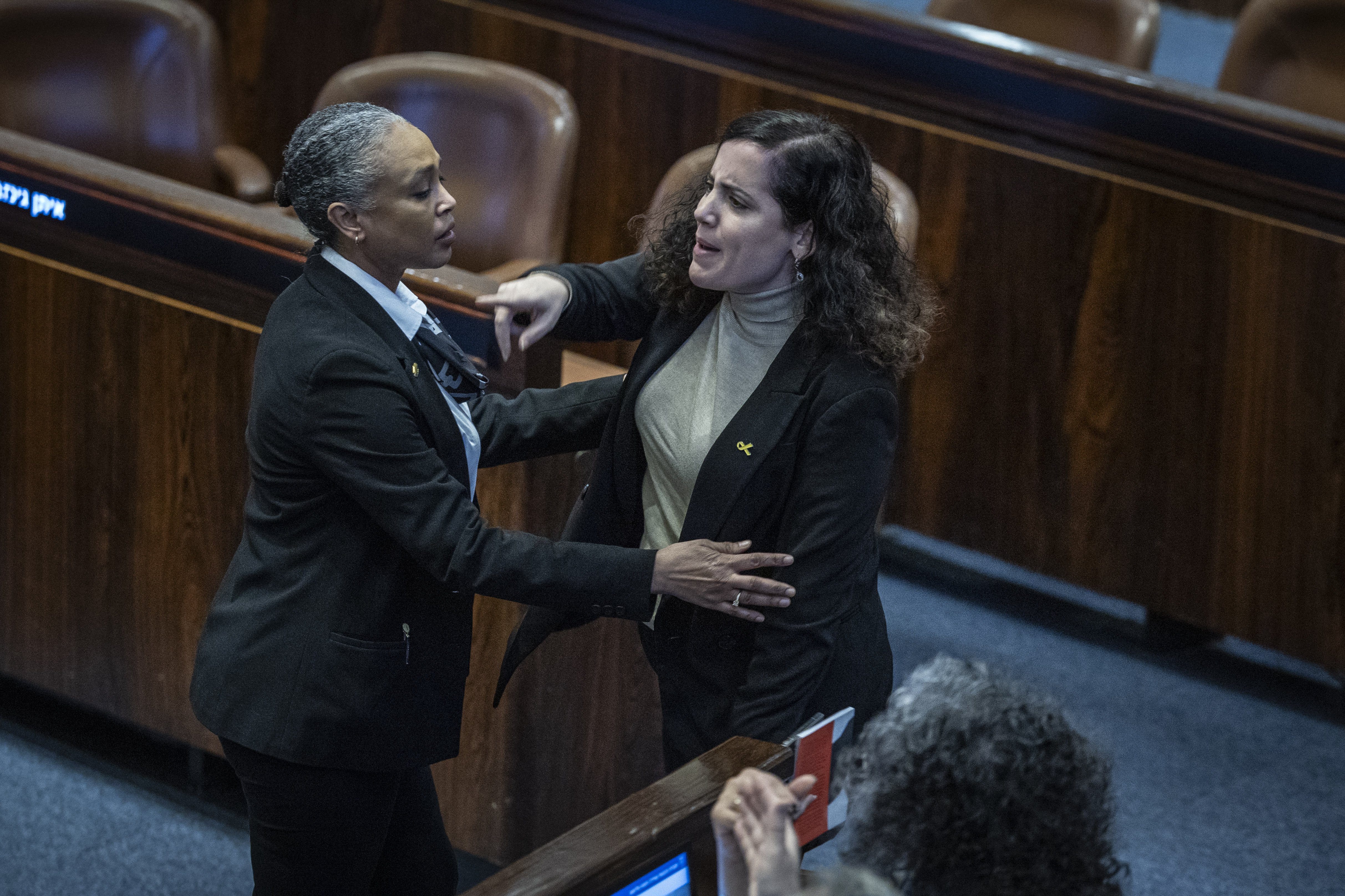 MK Naama Lazimi reacts at a 40 signatures debate, at the plenum hall of the Knesset, the Israeli parliament in Jerusalem, on December 8, 2025.