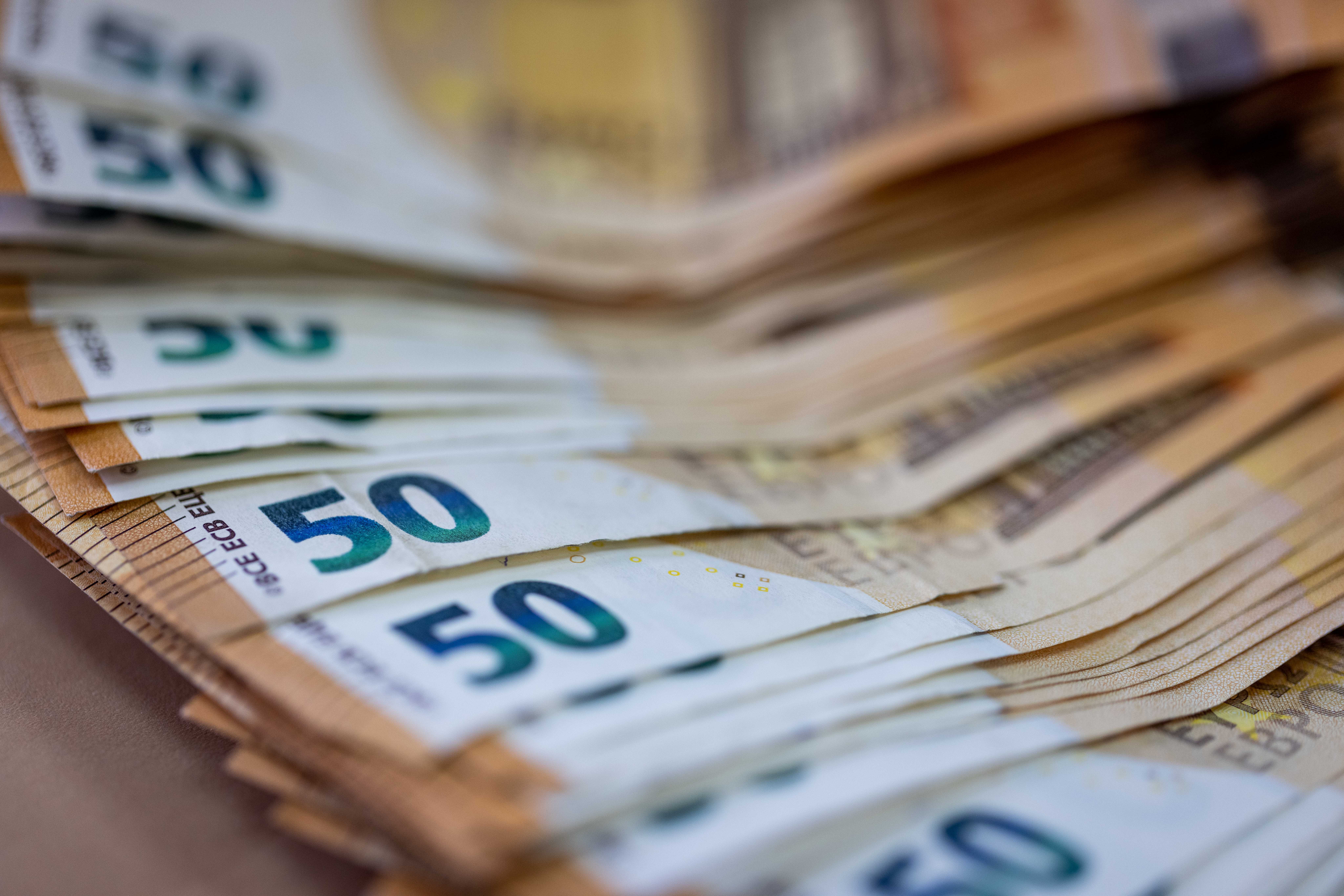 Lot of 50 euro bank notes on a table in Jerusalem, November 17, 2021.