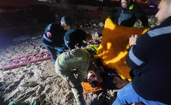 Search and rescue teams rescuing the teen from quicksand outside Jerusalem