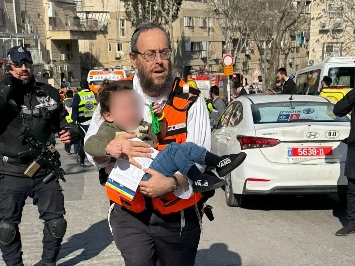 Children being rescued from the daycare in Jerusalem