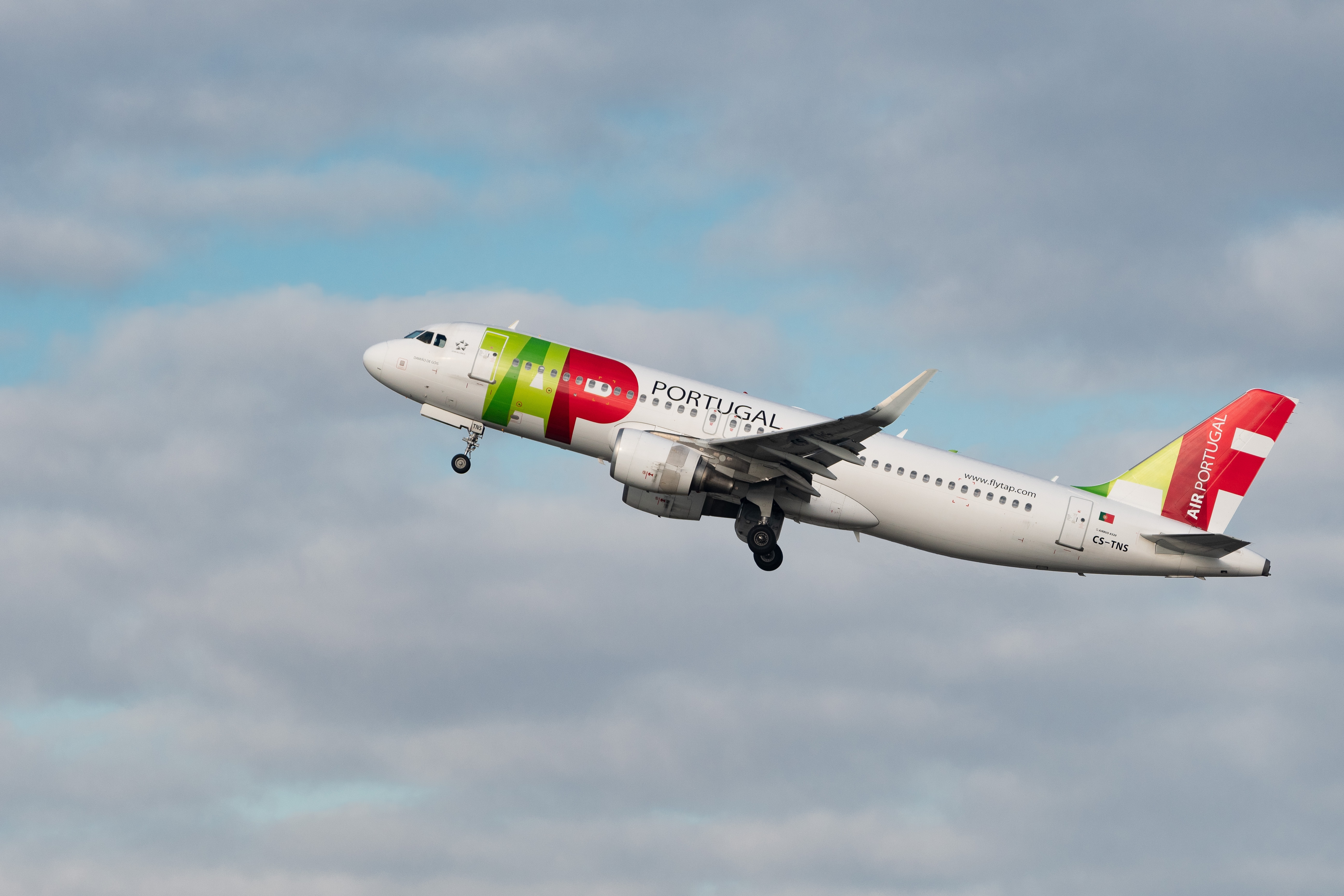 TAP Air Portugal Airbus A320-214 aircraft is taking off