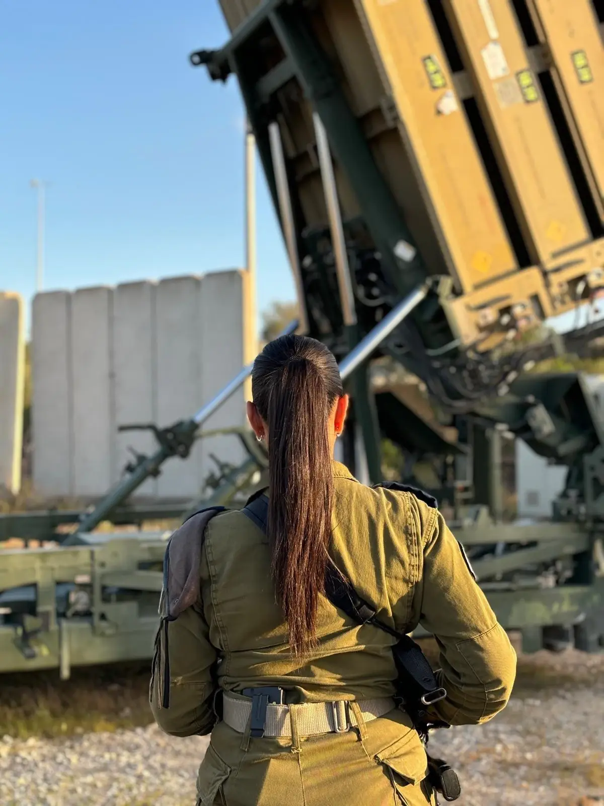 IDF Air Defense soldier infront of Iron Dome