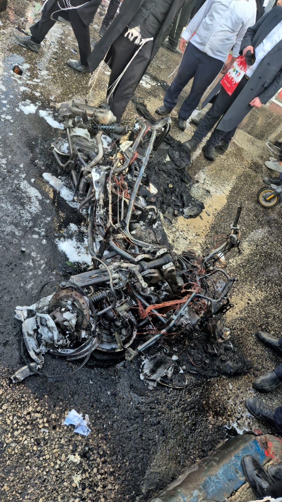 Motorbike that was burned by rioters