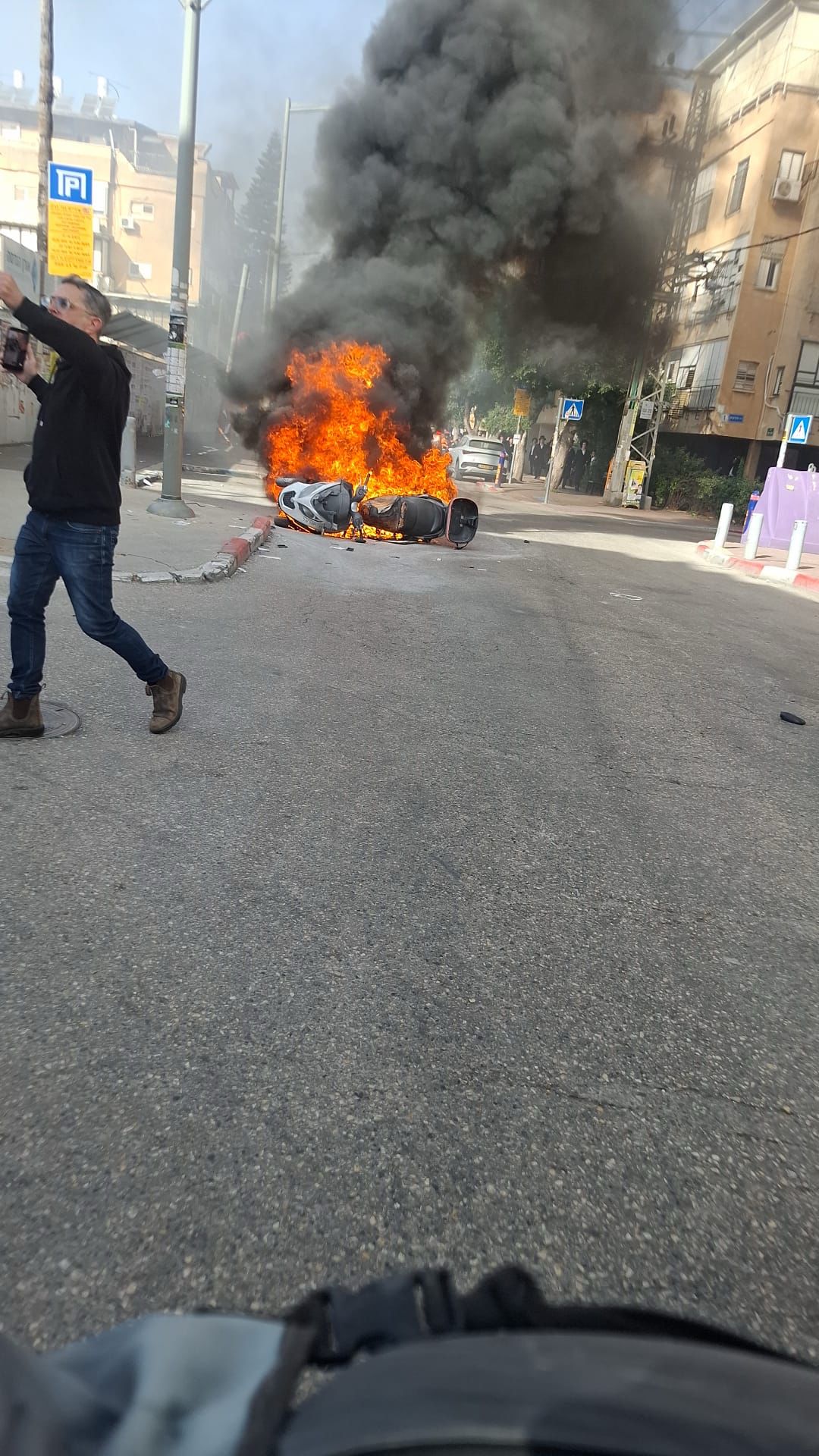 Motorbike that was burned by rioters