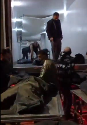 Truck transports body bags with murdered Iranians, Jan 2026