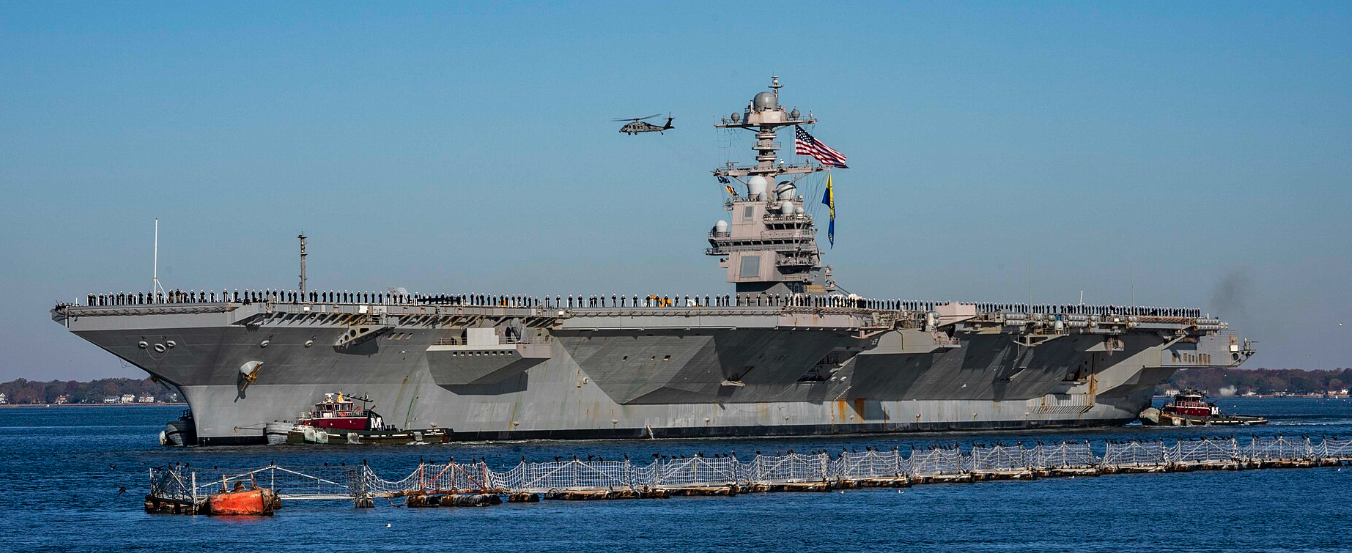 Gerald R. Ford returning to Naval Station Norfolk after completing her inaugural deployment to the Atlantic Ocean, 26 November 2022.