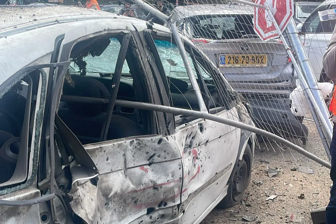 Iranian ballistic missile damages car