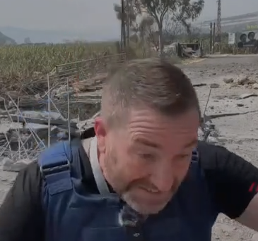 Seconds before Steve Sweeney is hit by shrapnel