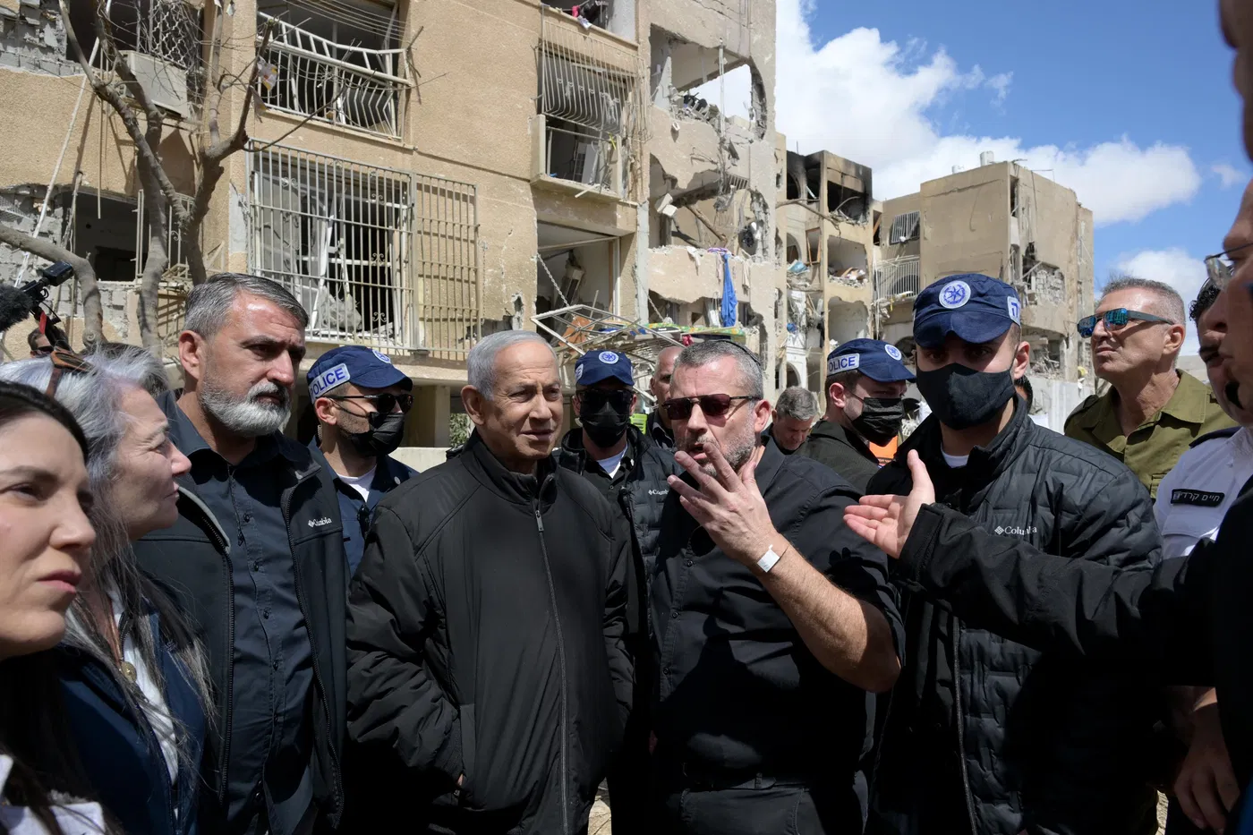 Netanyahu at the scene where a missile struck Arad