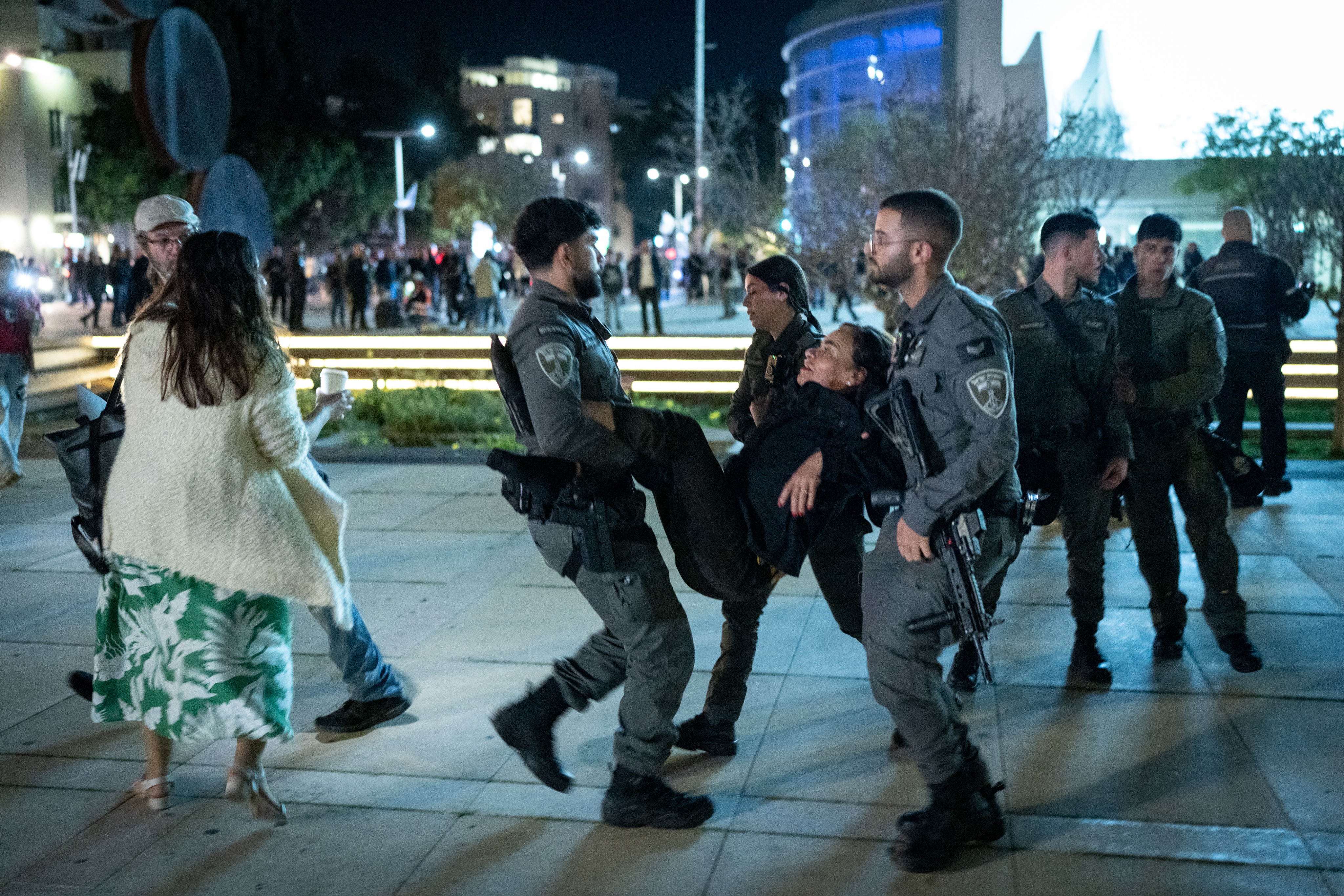 Israeli police disperse protesters and civilians during a protest against the current Israeli government and the ongoing war with Iran at Habima Square in Tel Aviv, March 28, 2026.