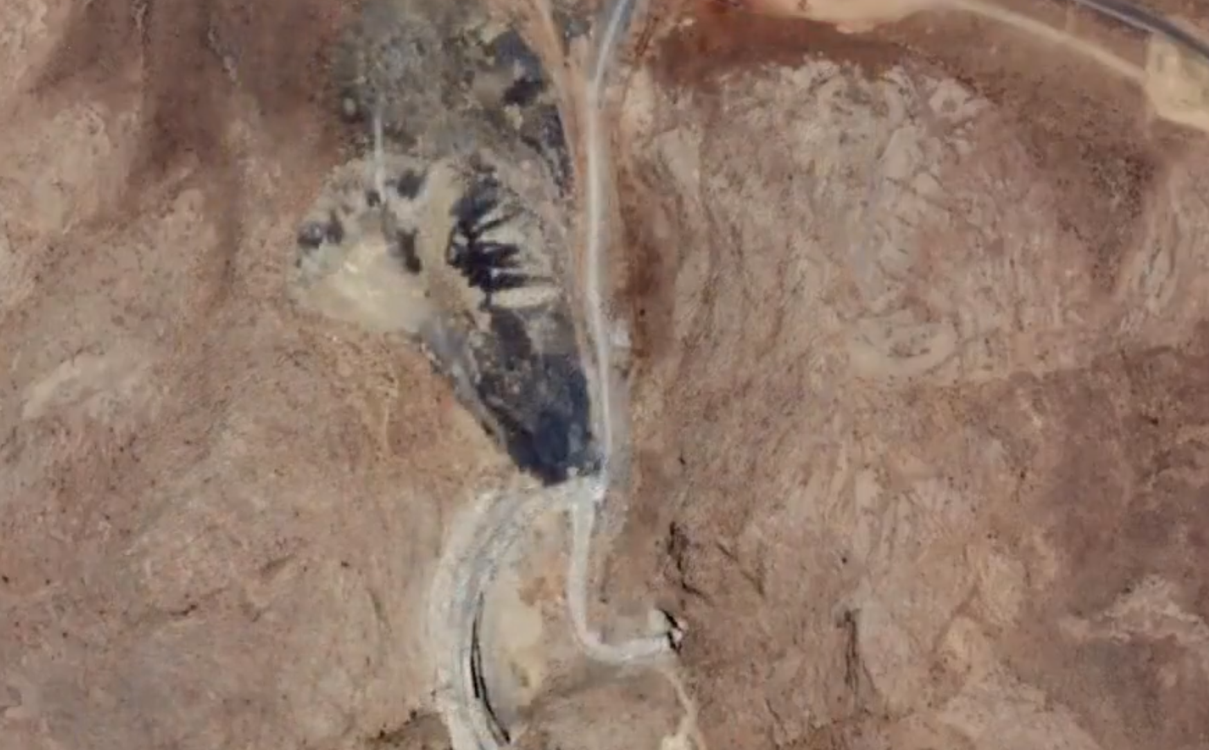 Iran clears rubble from underground missile base