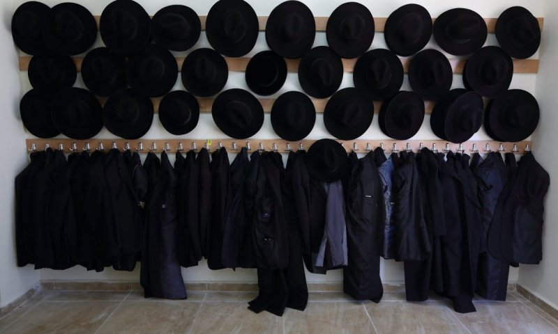 Black hats, black jackets