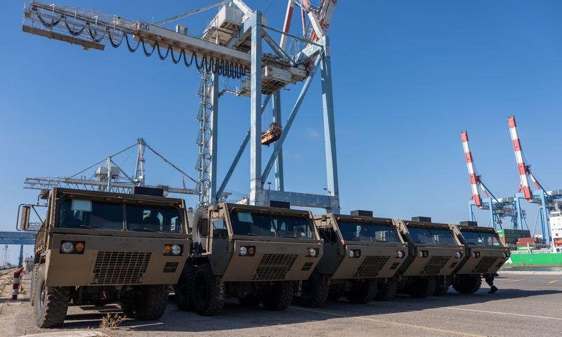 Army equipment being offloaded at the dock