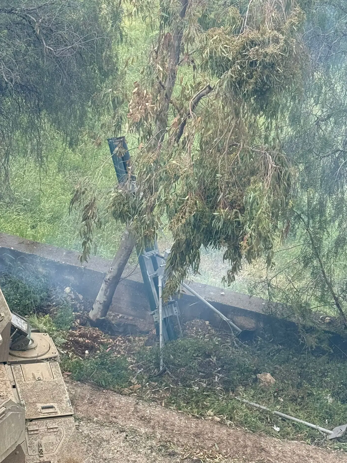 Launcher hidden behind a tree