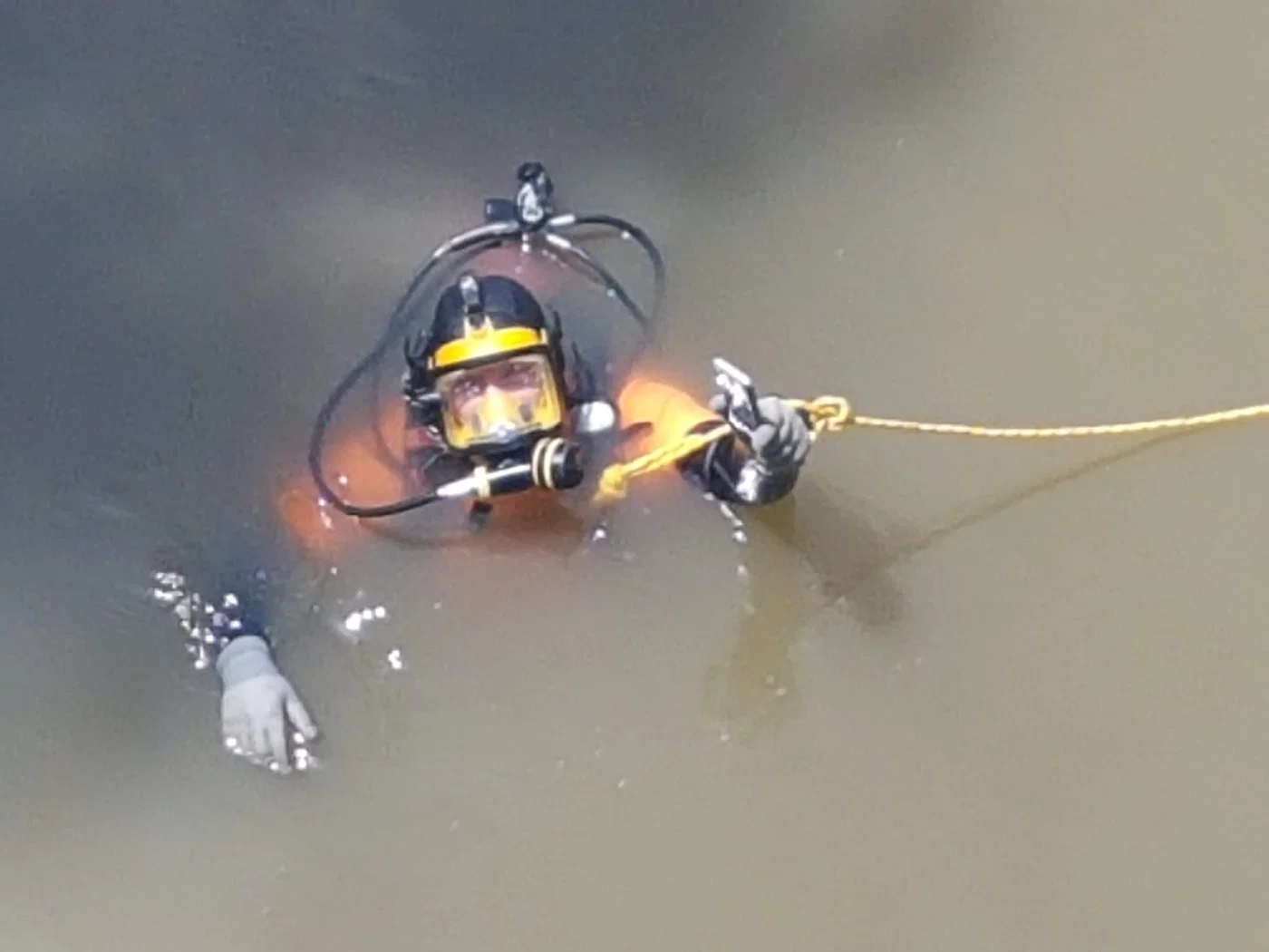 ZAKA diver find missing phones in Yarkon river