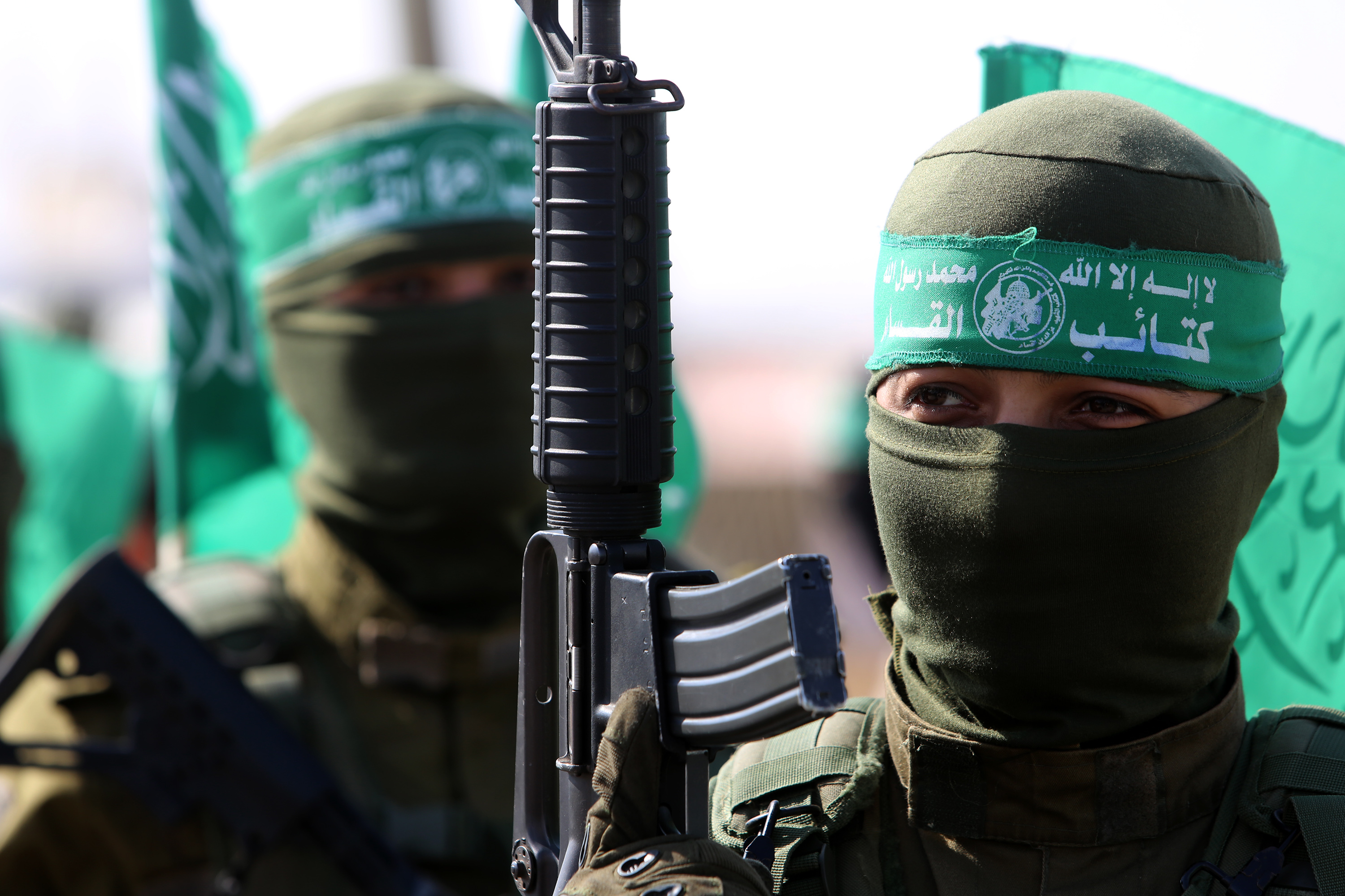 Hamas terrorists  take part in an anti-Israel military show in the southern Gaza Strip,
