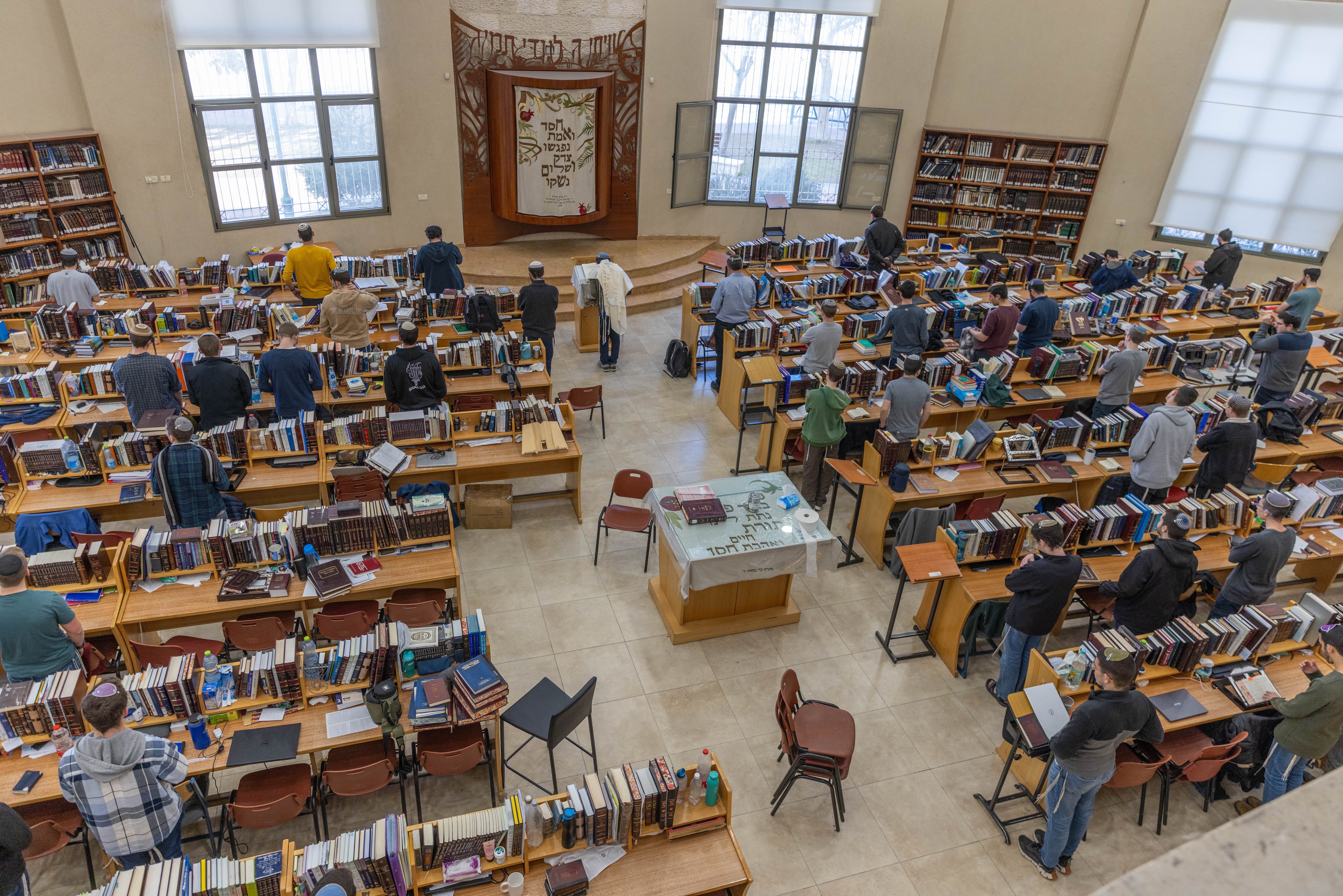 Jewish men study torah at the Yeshivat Hesder Yerucham, in southern Israel, February 20, 2024. 