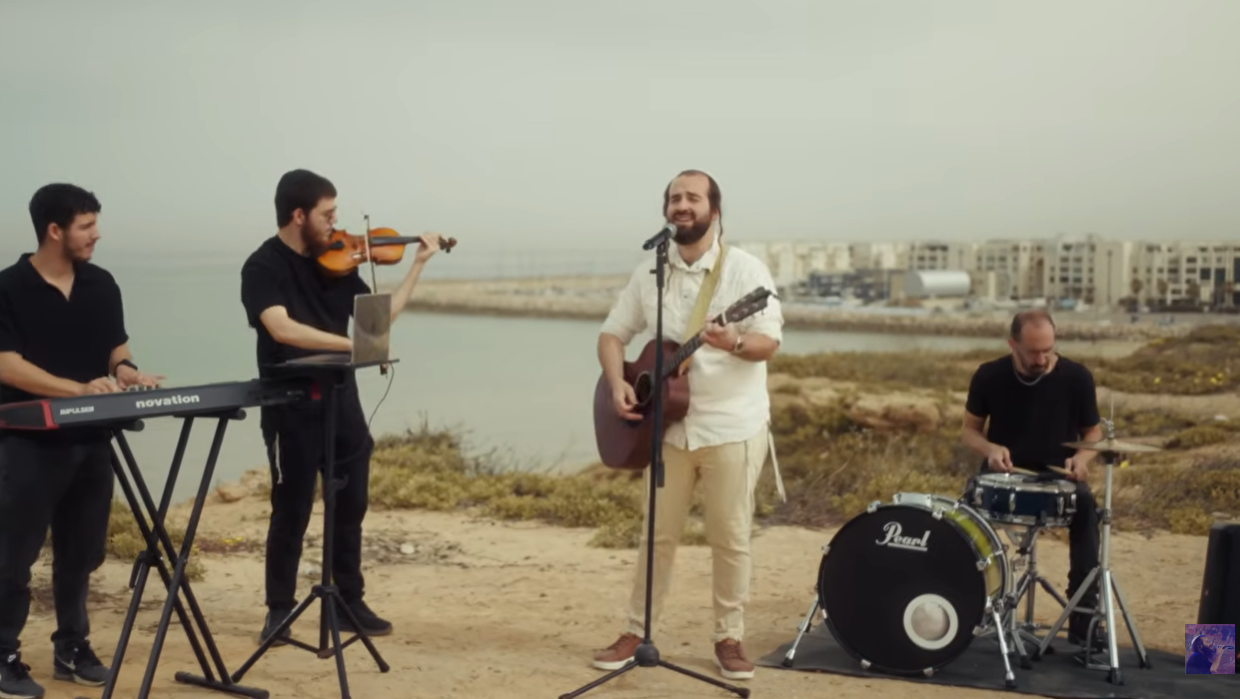 Avraham Yitzchak singing the new song.