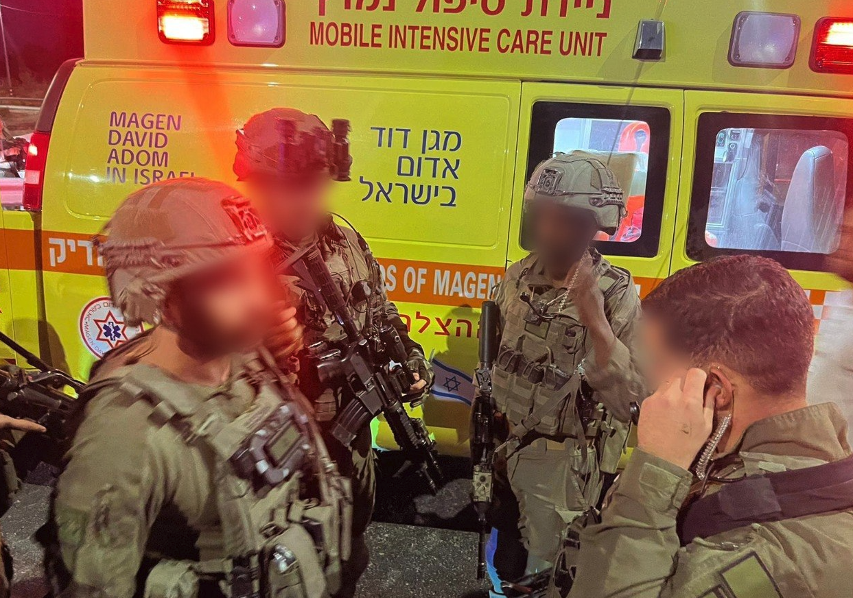 IDF soldiers at the site of a terror ramming attack, Gush Etzion