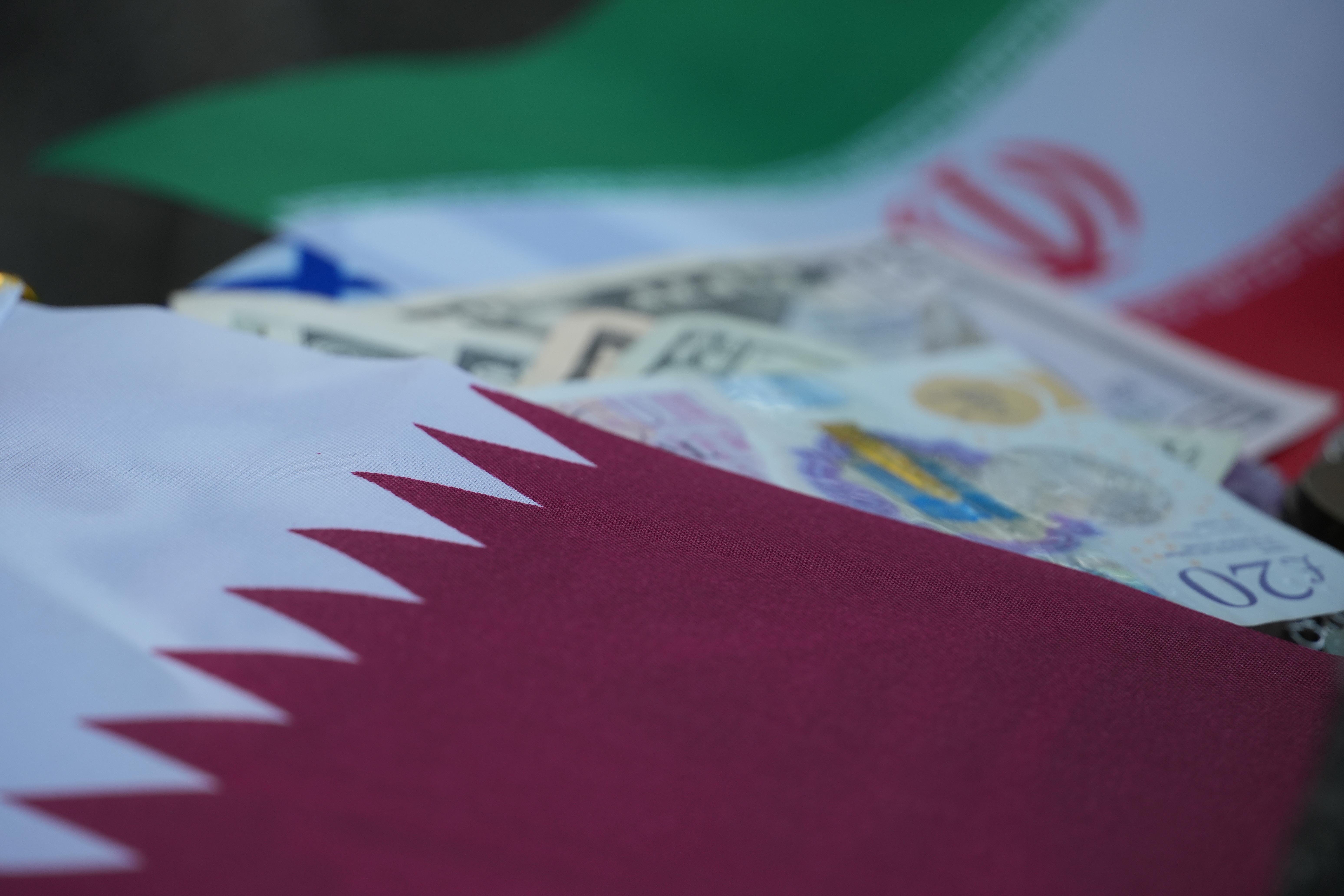 Iran, Qatar, money