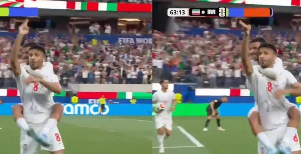 Iranian soccer player points a gun at the crowd