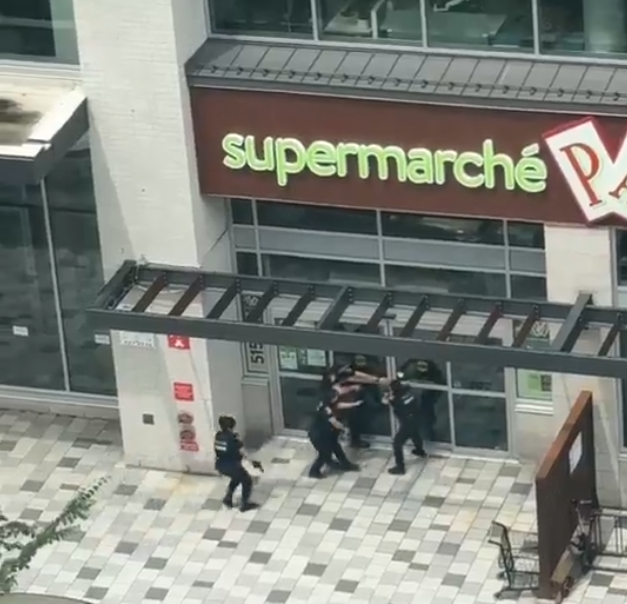 Police at the scene of a shooting in Montreal