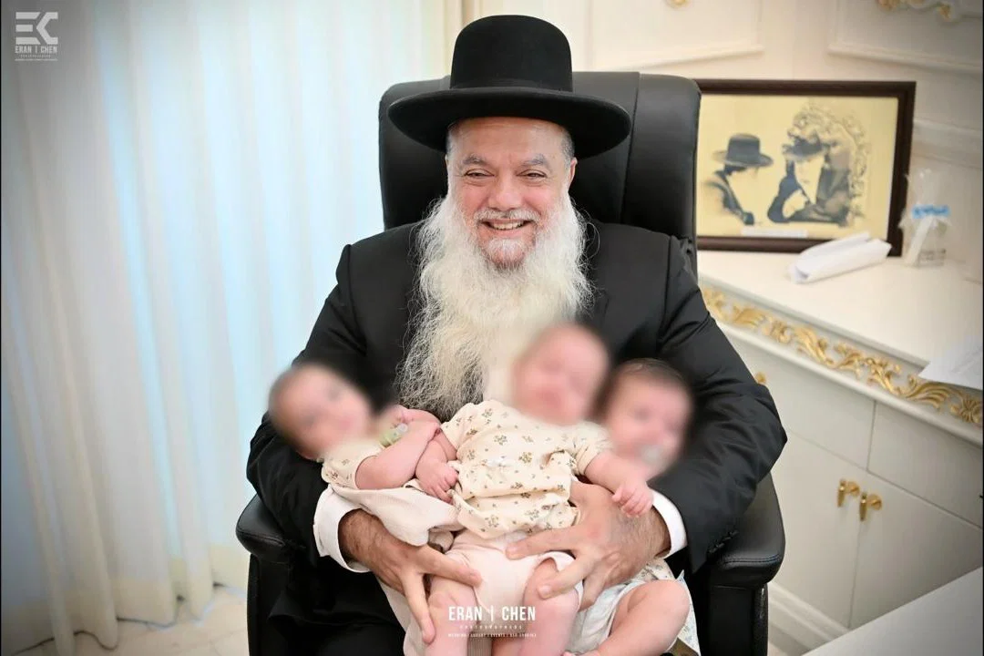 Rabbi Cohen with the triplets