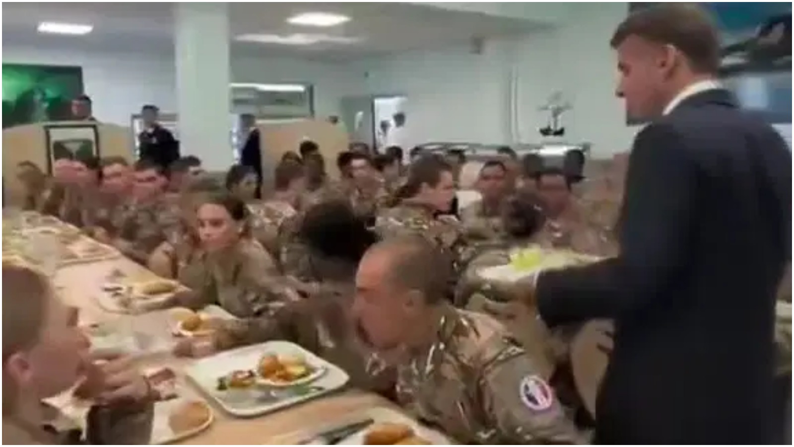 Macron Searched for a Seat in Air Force Mess Hall – Troops Kept Eating