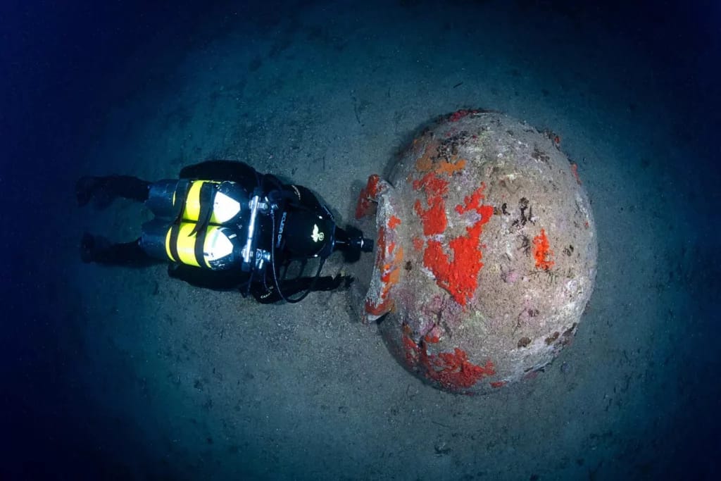 Diver next to the veseel that was discovered