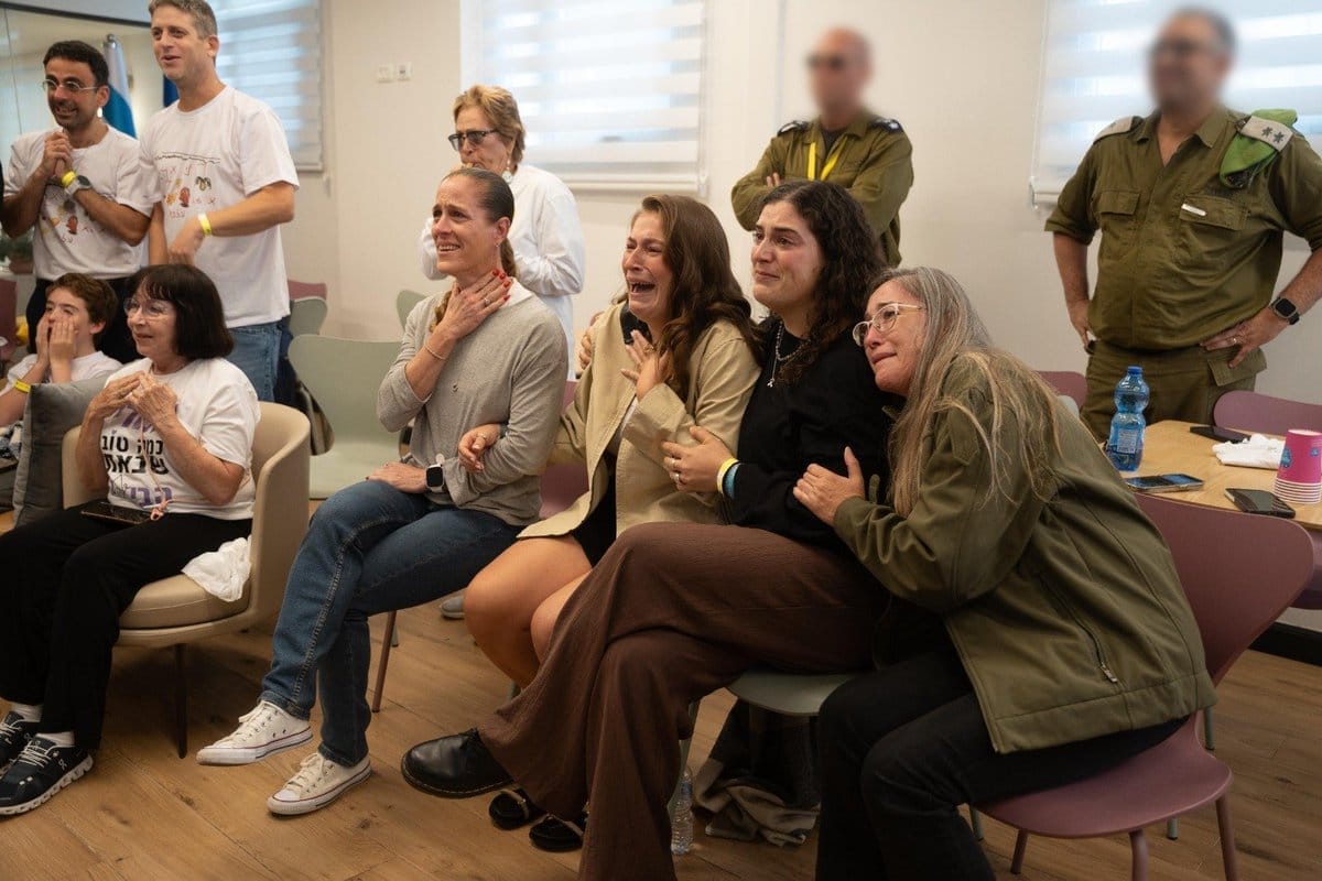 Omri Miran's family watches as he is released