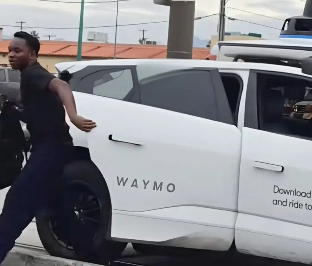Passenger flees self driving car stuck on railroad