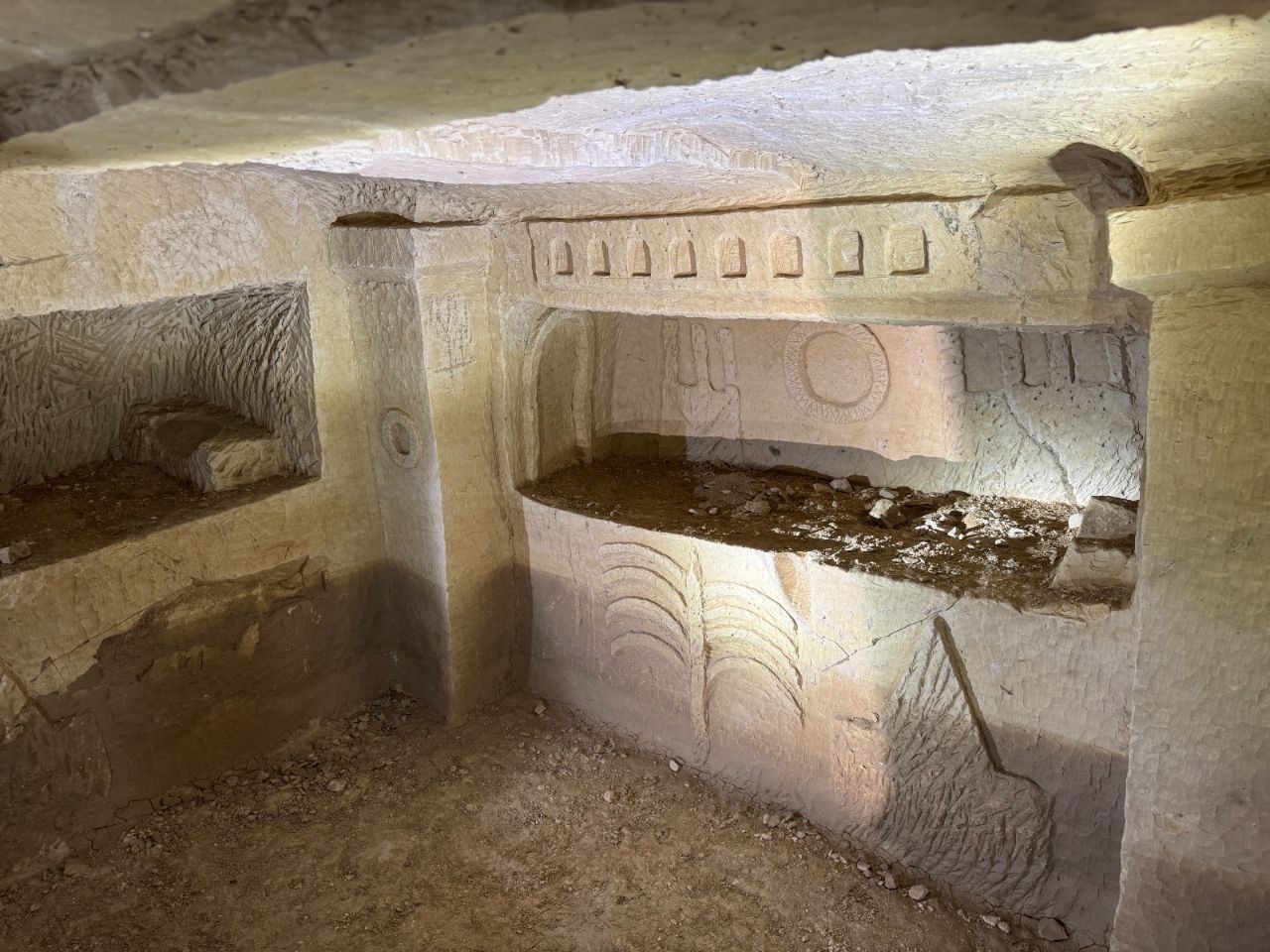 An ancient Jewish menorah in an ornate burial cave west of Hebron