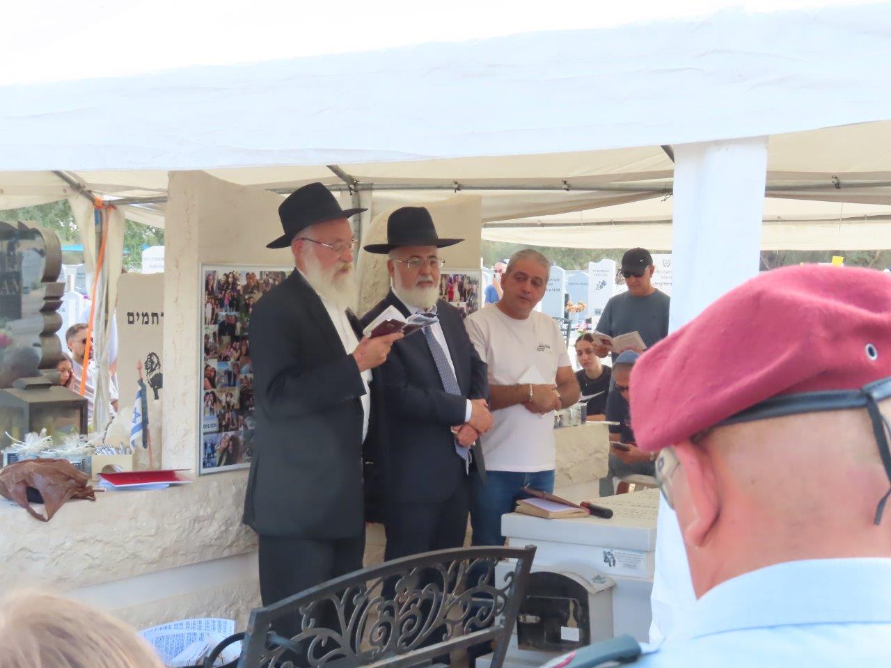 Bereaved families at the Ashdod cemetery