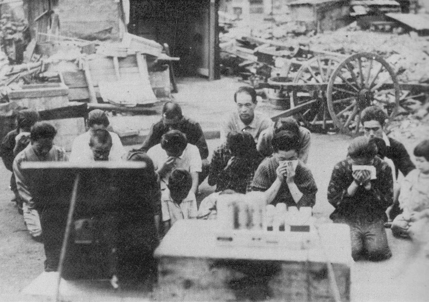Japanese Citizens Weep Listening to the Emperor’s Surrender on Radio)  