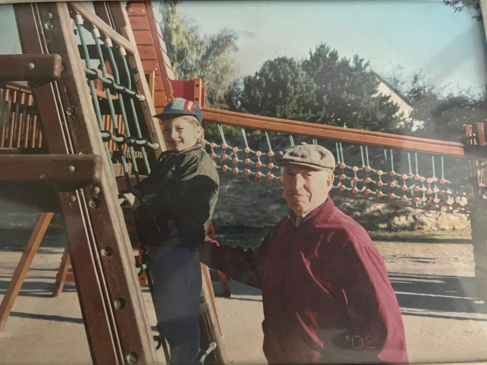 His victory: My late grandfather, overjoyed with his grandson, my older brother  