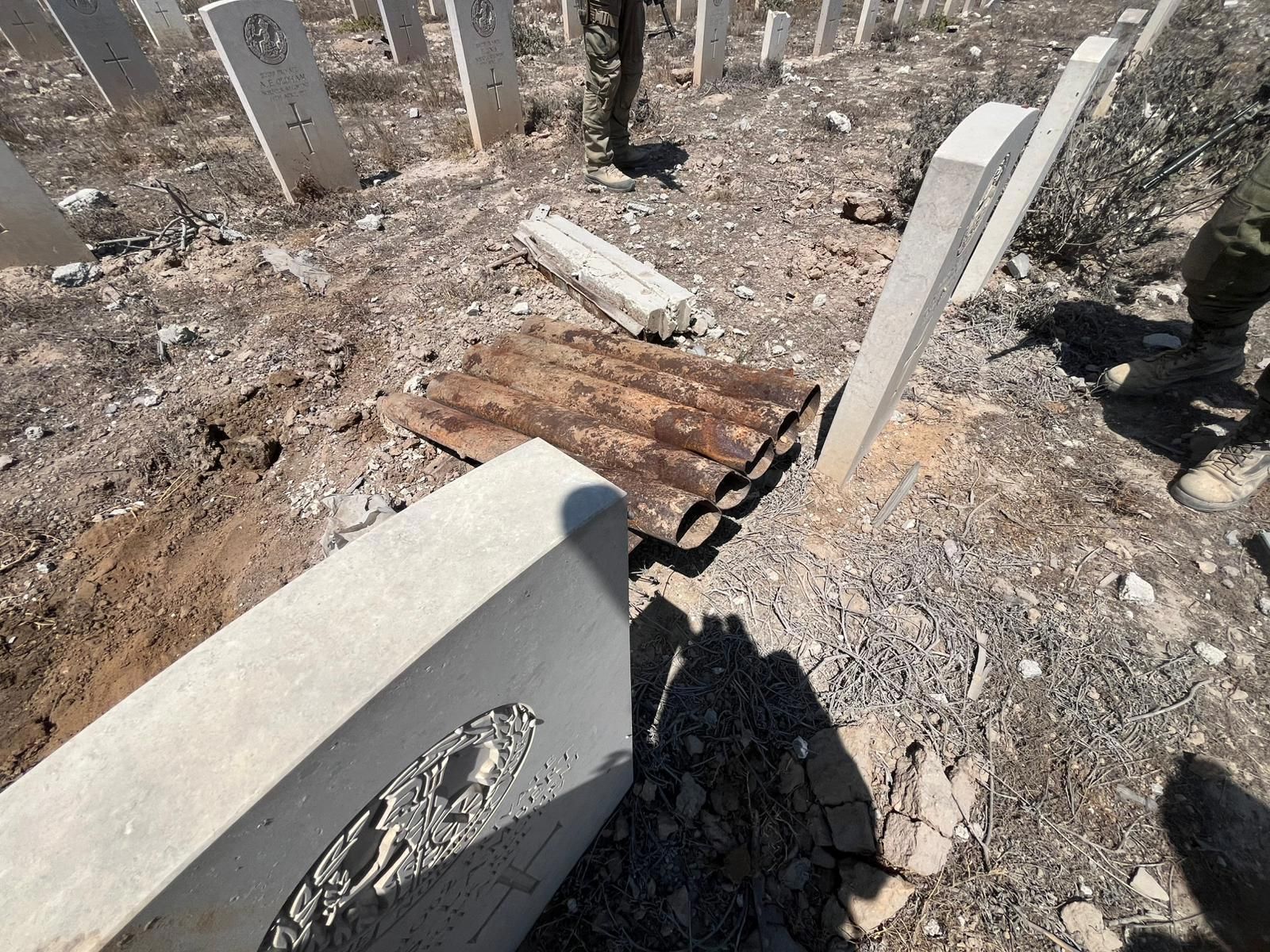 ocket launchers hidden inside a Christian cemetery