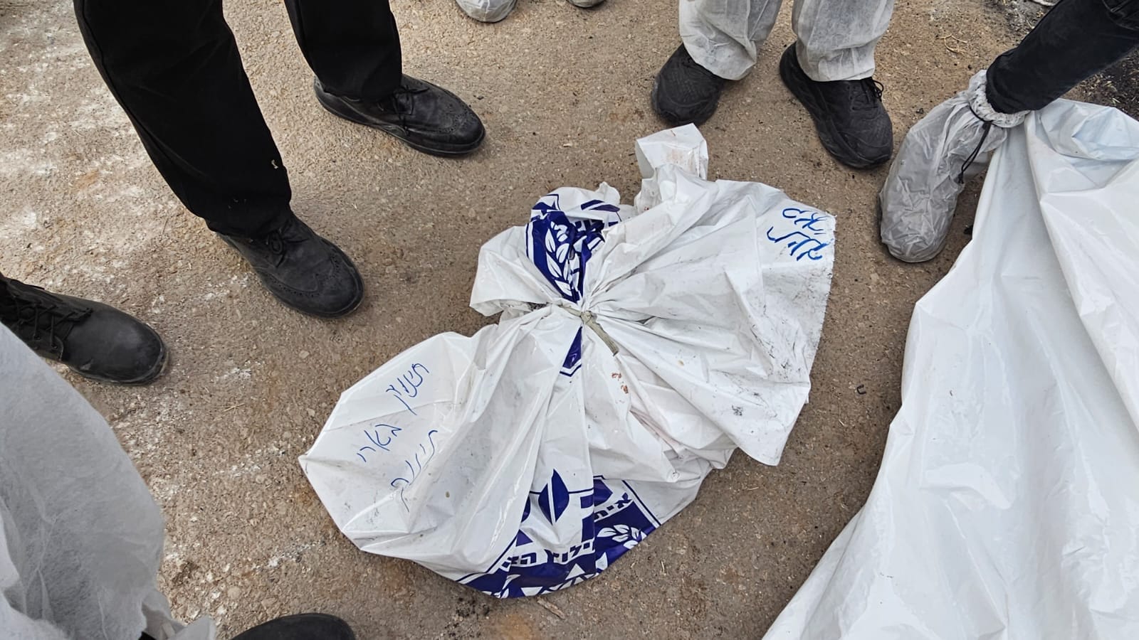 Body of an infant retrieved from the inferno | Photo: ZAKA