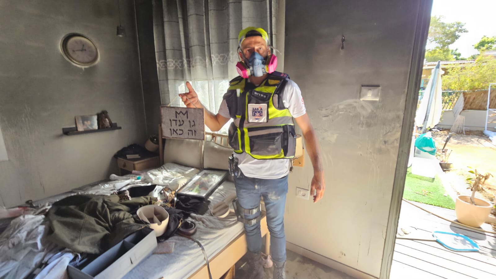 Yitzhak Eitach at one of the damaged homes | Photo: ZAKA
