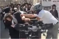 Scooter Rider Grabs Palestinian Flag from Neturei Karta March, Sparks Confrontation in Jerusalem