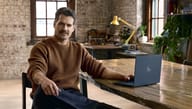 Henry Cavill with Google's laptop
