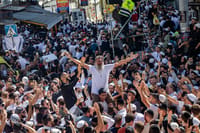 Jewish men in the street during Tikkun HaKlali near the tomb of Rabbi Nachman of Breslov in Uman, on eve of the Jewish holiday of Rosh Hashanah, September 22, 2025.